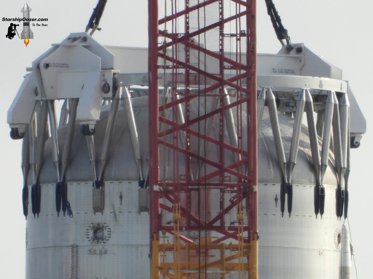 StarshipGazer's tweet image. A view of the booster lifter secured to the top of Booster 18 today.

11/22/25