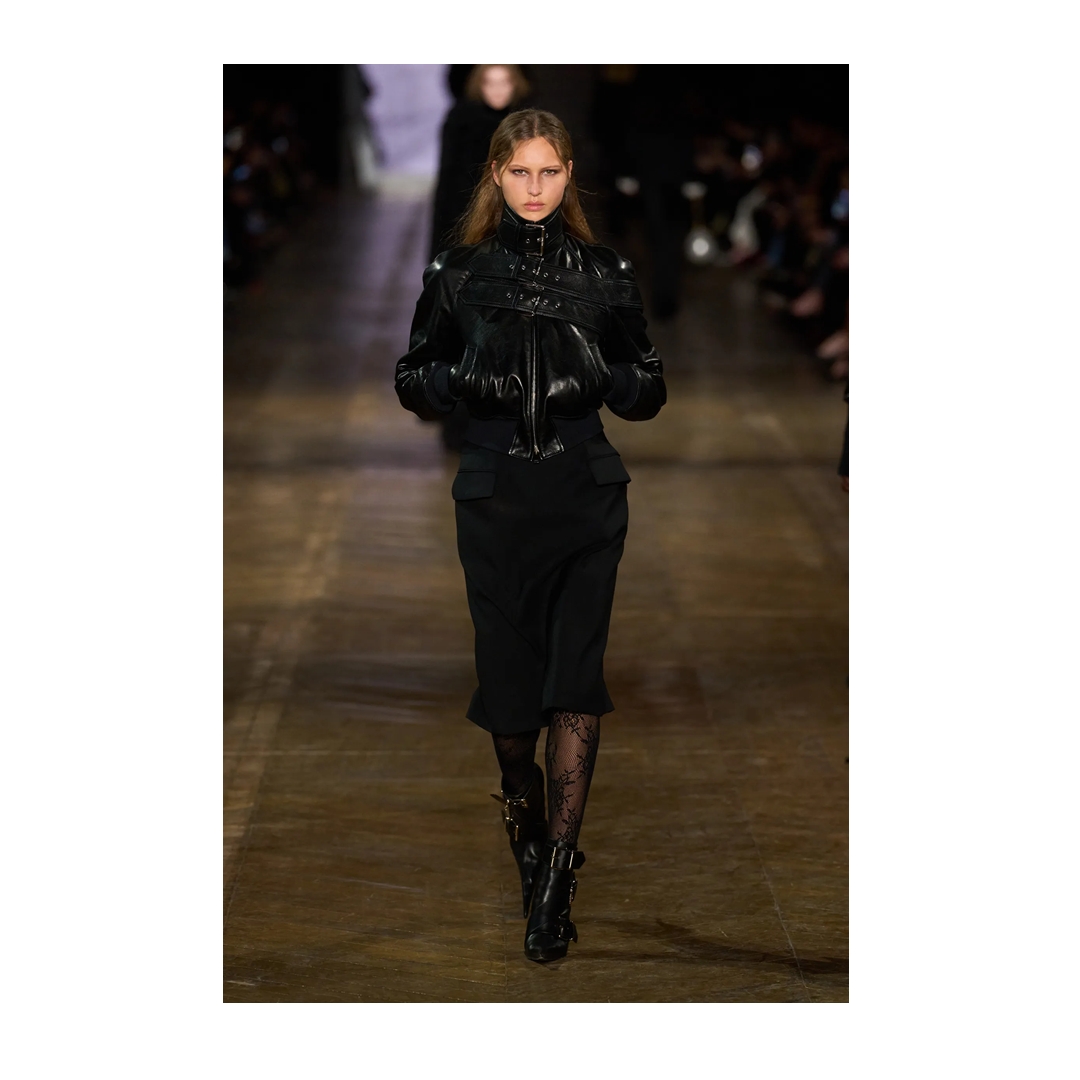 At her last European show in Paris, Gaga closed to 'La Vie En Rose', wearing the most stunning belt detail cropped leather bomber jacket from <a href="/McQueen/">McQueen</a>'s Fall/Winter 2025 collection!