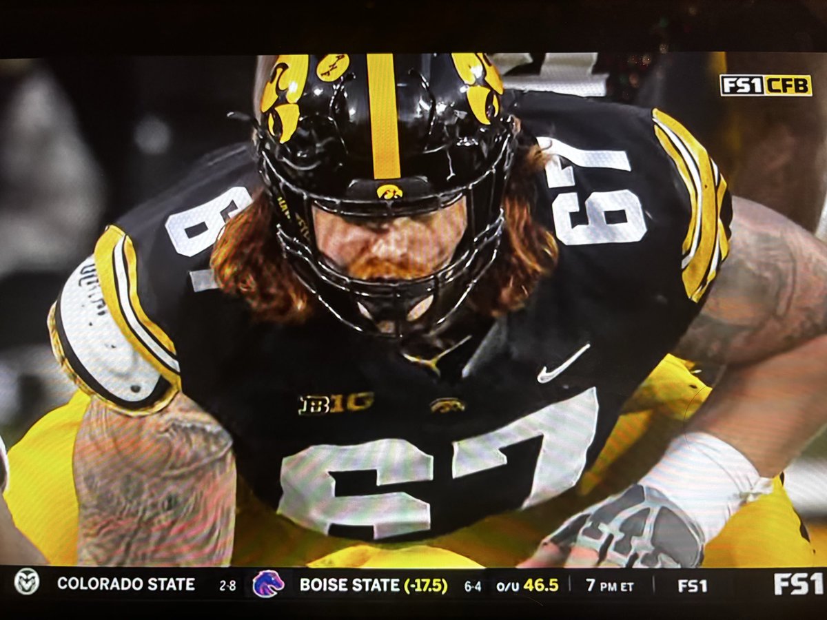 ChatGPT: Create an Iowa offensive lineman.
