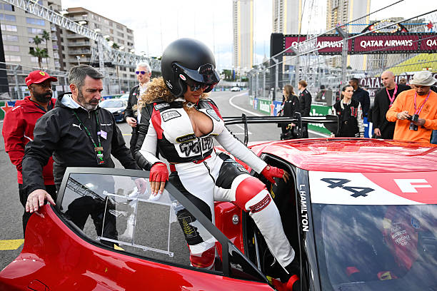 BEYONCE GETTING INTO CAR 44 FOR A HOT LAP WITH LEWIS HAMILTON