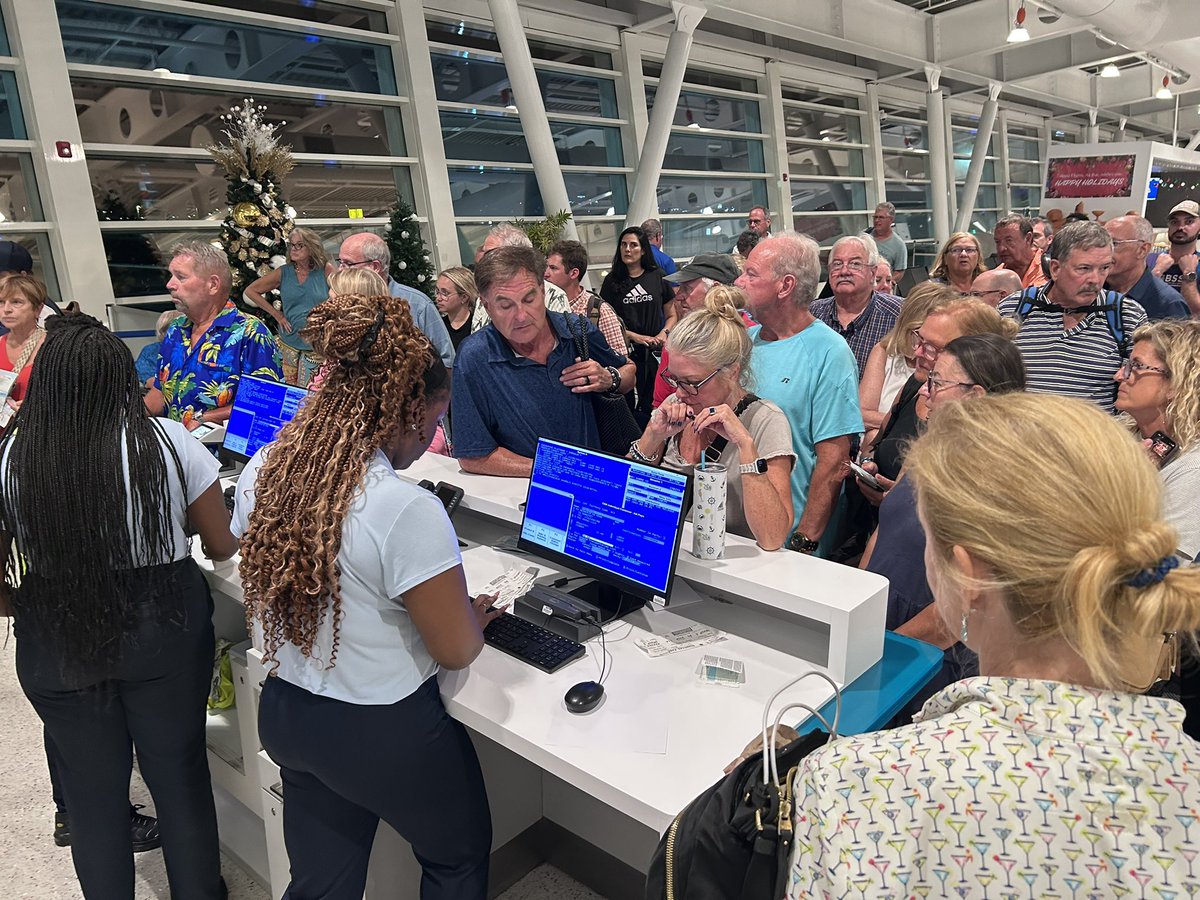 Susan_Fletcher's tweet photo. @AmericanAir - so we finally get assistance, only to find out that AA is literally training someone DURING AN INTENSE SITUATION, instead of having qualified people on hand to manage this chaos?  Complete FAILURE.  20 minutes per passenger to get help! https://t.co/f0ZH5SByxn
