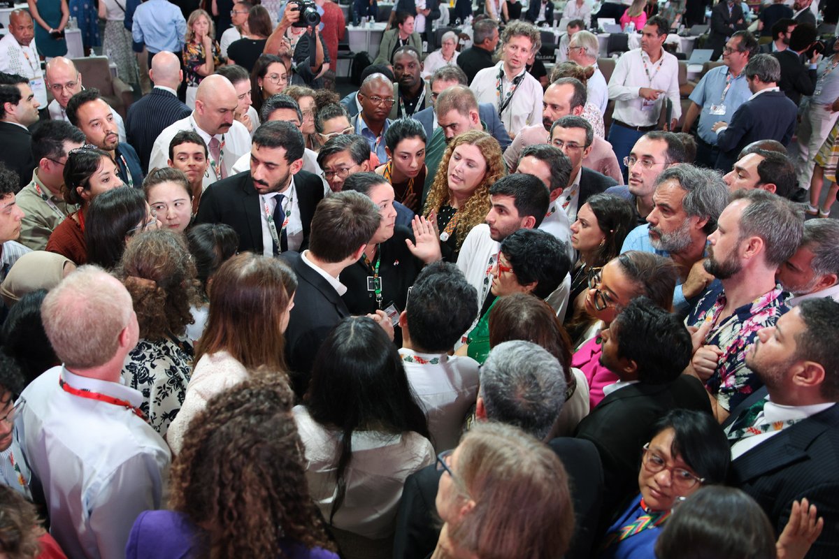 IISD_ENB's tweet image. As a result of the turmoil related to the adoption of decisions on the #mitigation work programme and indicators for the Global Goal on #Adaptation, the closing plenary was suspended for over an hour Saturday, with parties huddling in various parts of the room 

#COP30 #GGA