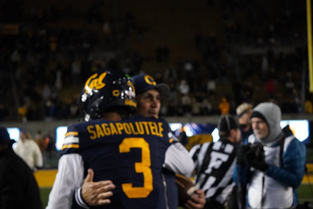 Morganzobeanzo's tweet photo. The GM and the QB — Jaron Keawe-Sagapolutele with Ron Rivera, post-game, after Cal defeats #21 ranked SMU. #theberkeleypulse #calgorithm #GoBears https://t.co/zVP4tAjCfv