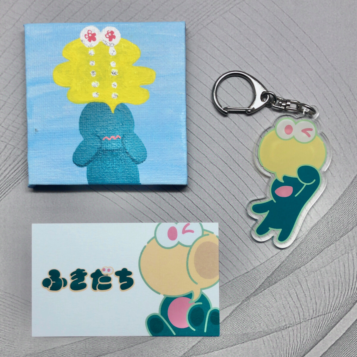 toshibon1206's tweet image. デザフェス戦利品10

(さわだ)ふうかさん(@morozoon)の「ふきだち」原画とアクリルキーホルダーを購入しました✨
原画の描き込みや色使いがすごく素敵で、見ているだけでほっと癒されます☺️
キーホルダーも可愛くて毎日眺めたくなる✨

#デザフェス戦利品
#デザフェス62リポスト
@designfesta