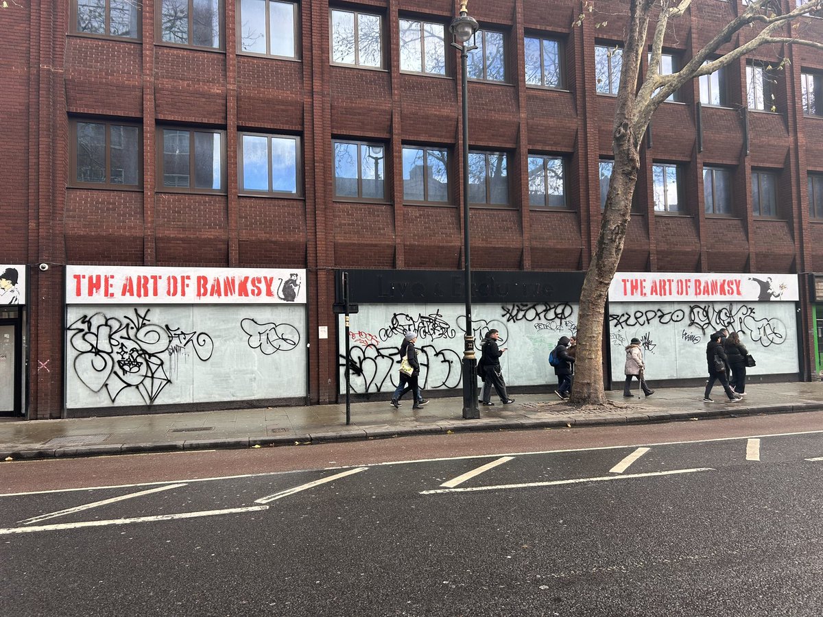 The Irony that <a href="/banksy/">Banksy</a> exhibition now has lots of shit graffiti scrawled all over it in central London
