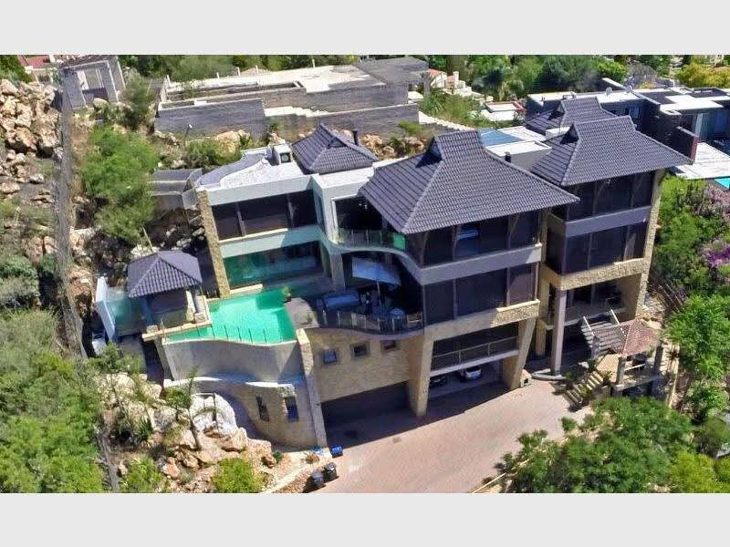 AFRICANDEMOC's tweet photo. This house is worth at least R18 million. It belonged to convicted criminal Rodaven krejcir.   

The new owner of this beautiful clinical  fortress is non other than Paul O'Sulluvin, a man who contributed to put Rodaven krejcir behind bars. 

After Rodaven krejcir was convicted, his house was preserved by SARS for tax issues. Well its common that assets preserved by the state or state agencies are eventually sold public auctions. 

Well this time around, this house was sold to the same Paul O'Sulluvin through a " private auction" . At the time of the sale in 2015 it was worth R15 million. 

Cedric Nkabinde said they ploted downfall of individuals in the same house,together with a team from AfriForum ,Democratic Alliance and a Boer journalist. 

Private auction wow. 

Where does Paul O'Sulluvin get R15 million, the guy is unemployed. Only dirty work for him. Fixing and extortion. 

Okay what we know is that he led a team that tracked and recovered Cyril Ramaphosa Phala phala money, the team comprised of Shadrack Sibiya,  Vusumuzi Cat Matlala. 

We expect this information to before the Ad hoc Committee and Madlanga commission. 

My worse fear is that they have something against judge Madlanga,  that's why they appointed him. Whatever they have against him will be used as leverage. Remember not everyone is clean unless your a one day old.