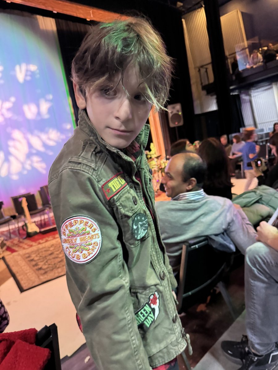 SteveConteNYC's tweet photo. My drummer boy, before his performance of Nirvana’s “Come As You Are” at his school’s “Coffeehouse”. 
He’s rocking a jacket made by @rockthejacket that was given to me years ago for my older son. Zia no longer fits it – but now it’s got a new life with Bazzy!

#BazConte  #Nirvana https://t.co/Gmk2HAZbli