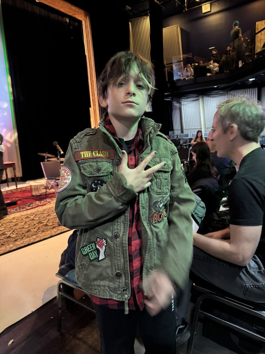 SteveConteNYC's tweet photo. My drummer boy, before his performance of Nirvana’s “Come As You Are” at his school’s “Coffeehouse”. 
He’s rocking a jacket made by @rockthejacket that was given to me years ago for my older son. Zia no longer fits it – but now it’s got a new life with Bazzy!

#BazConte  #Nirvana https://t.co/Gmk2HAZbli