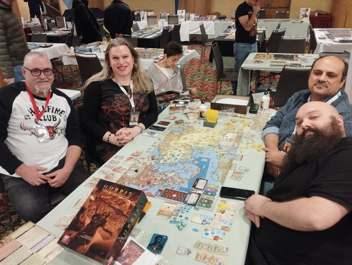 Balaclaba's tweet image. #Hubris at #Batalladores25 
Morgane Gouyon-Rety as a teacher.
She&apos;s done It again. 
Very, very, very fun, yet deep enough for hardcore gamers.  Great desing 
Absolutely,the nirvana of wargaming @gmtgames @ClubBatallador