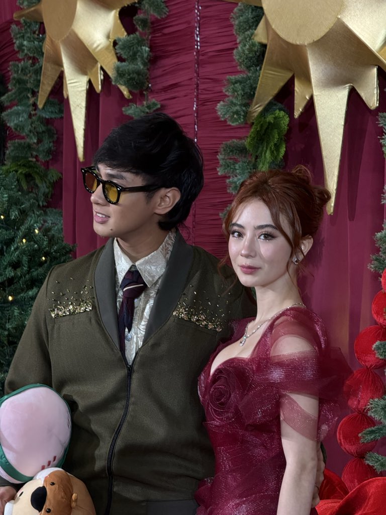 A SPECIAL NIGHT FOR JMFYANG 💓 

LOOK: JM Ibarra and Fyang Smith (or JMFyang) showed up in glamorous outfits on the Star Magical Christmas red carpet in shades of red and green. | <a href="/HMallorcaINQ/">Hannah Mallorca</a>