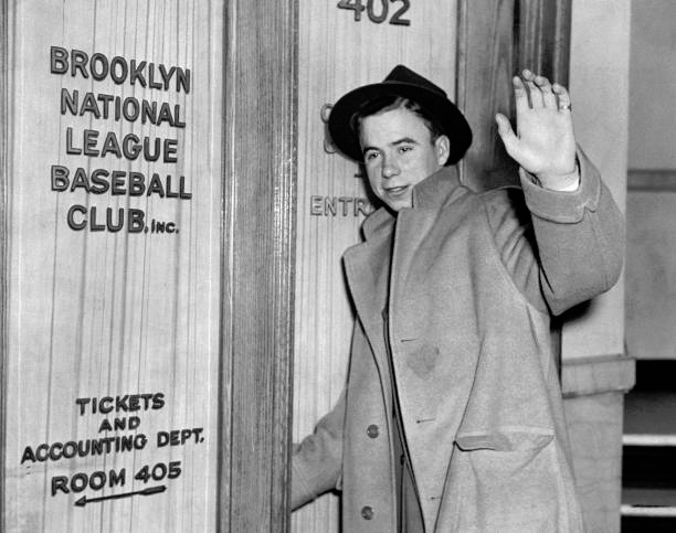 Jimfrombaseball's tweet photo. "Racists screamed slurs at the black man until the white man from Kentucky walked across the infield and put a hand on Robinson's shoulder. The act said they were in this together.
They were black and white, human beings and Dodgers.
There is an even better story.
It defines Reese's personality and explains why so many people came to think of him as extraordinary. It tells us about his poise, wit and courage. It tells us why he was the Dodgers' Captain and why, half a century later, his friends still call him 'The Captain'.
It happened in Atlanta in 1947.
A letter had come to Robinson with a promise that the Ku Klux Klan would kill him if he showed up in that city's Ponce de Leon Park.
That night, as the Dodgers were warming up, Robinson and Reese threw from spots alongside each other.
Then Reese looked at Robinson.
'Damn, Jackie, get the hell away from me, will you? The guy might be a bad shot.'
They laughed and went on throwing.
They were Hall of Fame players, and they were better people.
In the winter of 1997, preparing a magazine story on the 50th Anniversary of Robinson's rookie season, a sportswriter called Reese to talk about Robinson.
'Aw, no. You know the Jackie stories better than I do by now.'
'But, Pee Wee, I need your voice.'
'Just don't make me out to be a hero.
It took no courage to do what I did.
Jackie had the courage.
If it had been me, a white man, trying to be the only one in the black leagues, I couldn't have done it.
What Jackie had to endure, the criticism, the catcalls -- I wouldn't have had the courage. Jackie could help us win!
I wanted to win, I wanted him on our team. That's it.'"
Dave Kindred