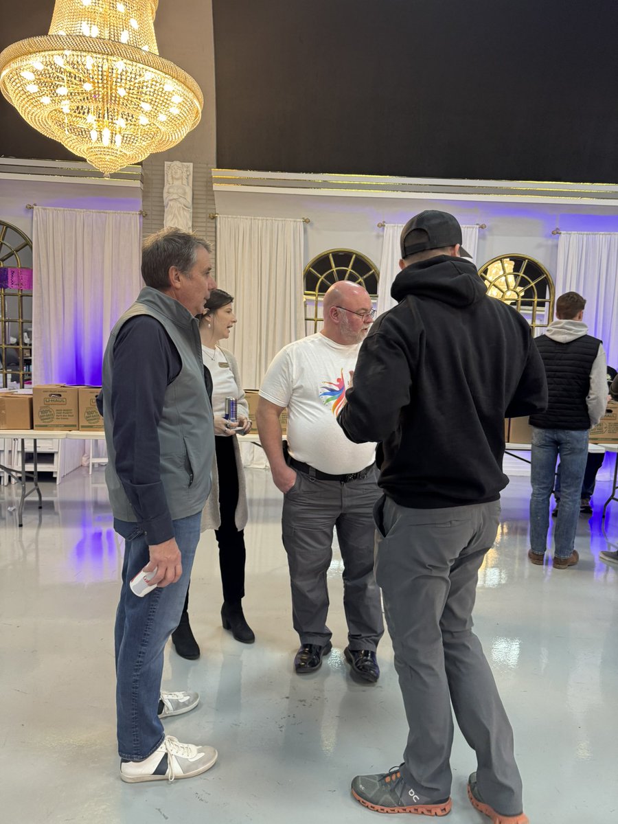 The Omaha Chapter of the National Latino Peace Officers Association held their annual Holiday Meal Giveaway at the Hispanic Arts Center this weekend. Rebecca and I enjoyed helping them give away 150 Thanksgiving meal boxes to families in need around the community. Their goal is