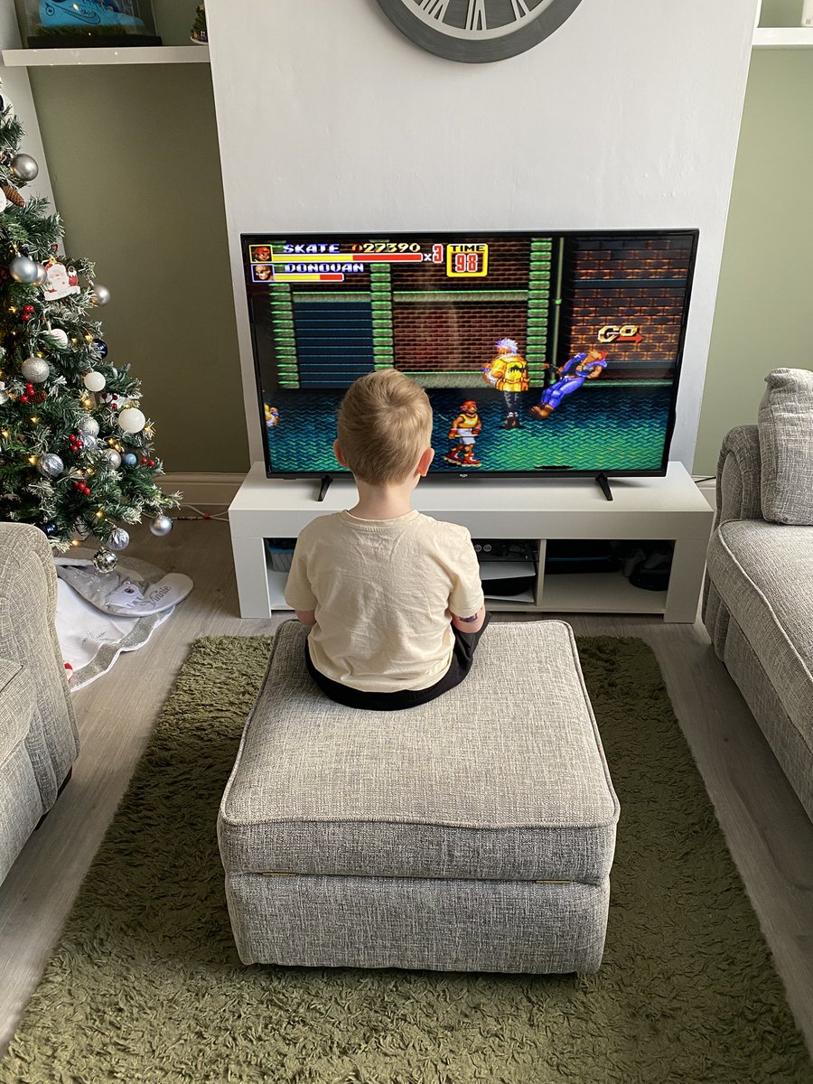 Thought I’d teach the little man Streets  of Rage earlier. Classic game.