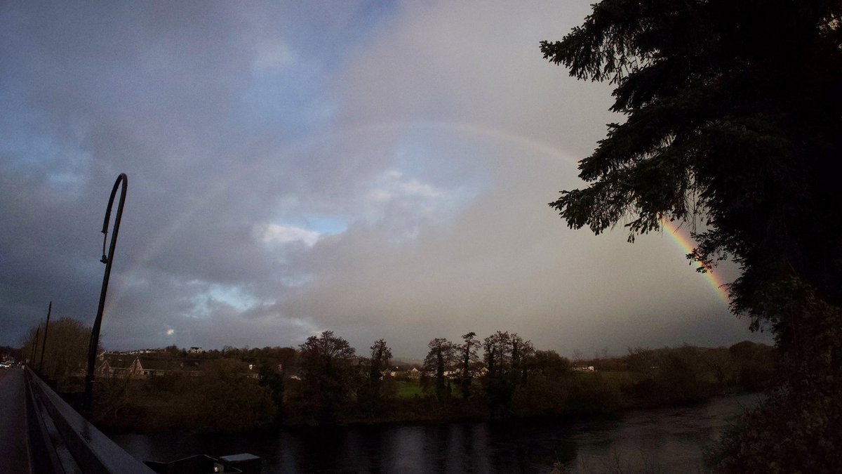nightly_moth's tweet image. On the road to the venue for tonight&apos;s Rough and Rowdy Ways Show. @bobdylan and his band in Killarney, Ireland. Rainbow over the river by the venue.