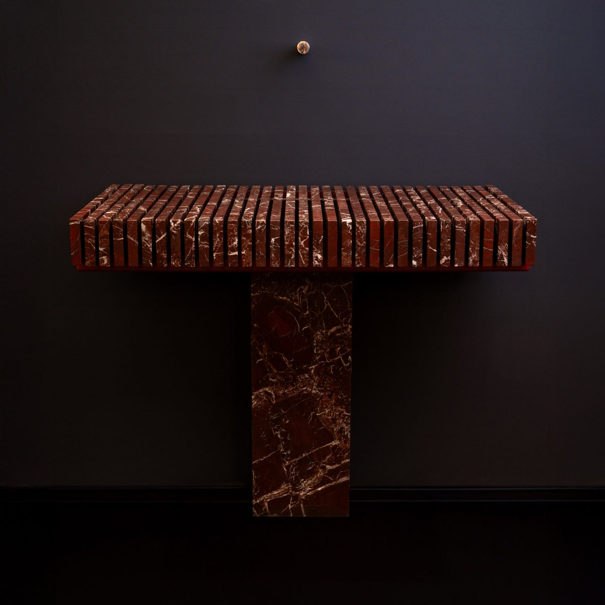 dezeen's tweet photo. Water disappears through gaps in Serafini's "sculptural yet functional" Piano washbasin: https://t.co/sGCLvsdUFm https://t.co/bhQ0LQxfDB