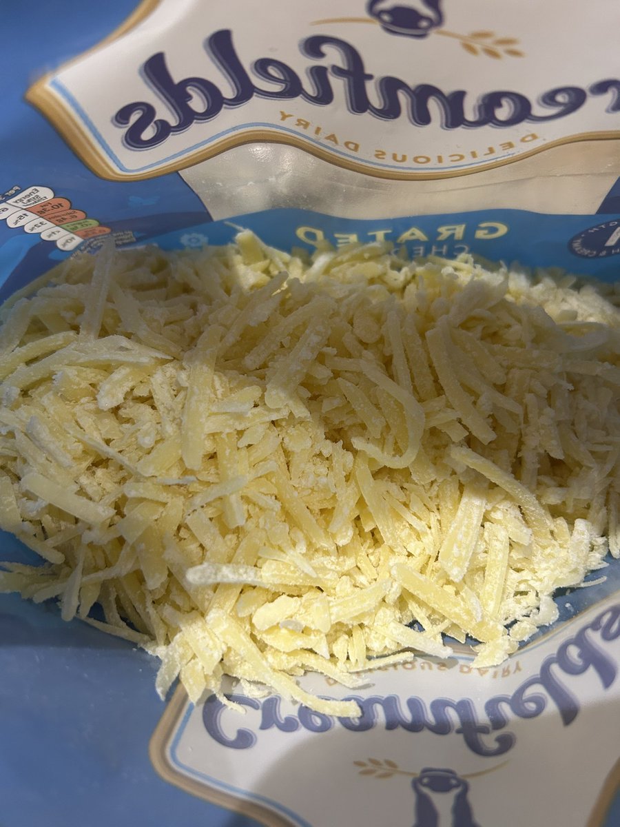 phughes22's tweet photo. @Tesco just bought yesterday, looks a bit starchy/floury. Is this ok to consume?? Always buy this cheese and never any issues in the past. https://t.co/Dh3Rf3kGOn