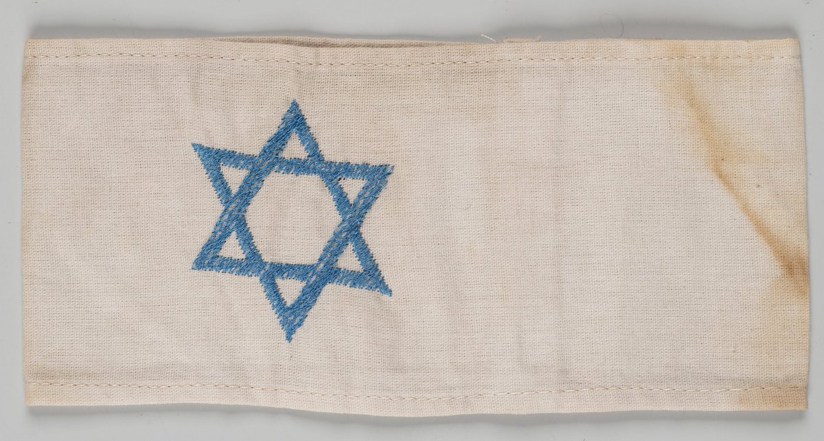 23 November 1939 | Hans Frank, the head of the General Government (a part of German-occupied Poland), issued an order requiring all Jews aged 10 and above to wear a white cloth armband, 10 cm wide, marked with a blue Star of David on their right arm.

It was the first instance