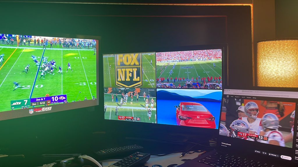 My TV broke so I threw two smaller TVs from the attic in that space. So now I’ve got:

🏈 RedZone 
🏈 DAZN multi-view for four feeds where I can select what audio I want
🏈 The Pats game on the laptop 
🏈 Twitter on the phone for updates 

A man can never have too many screens