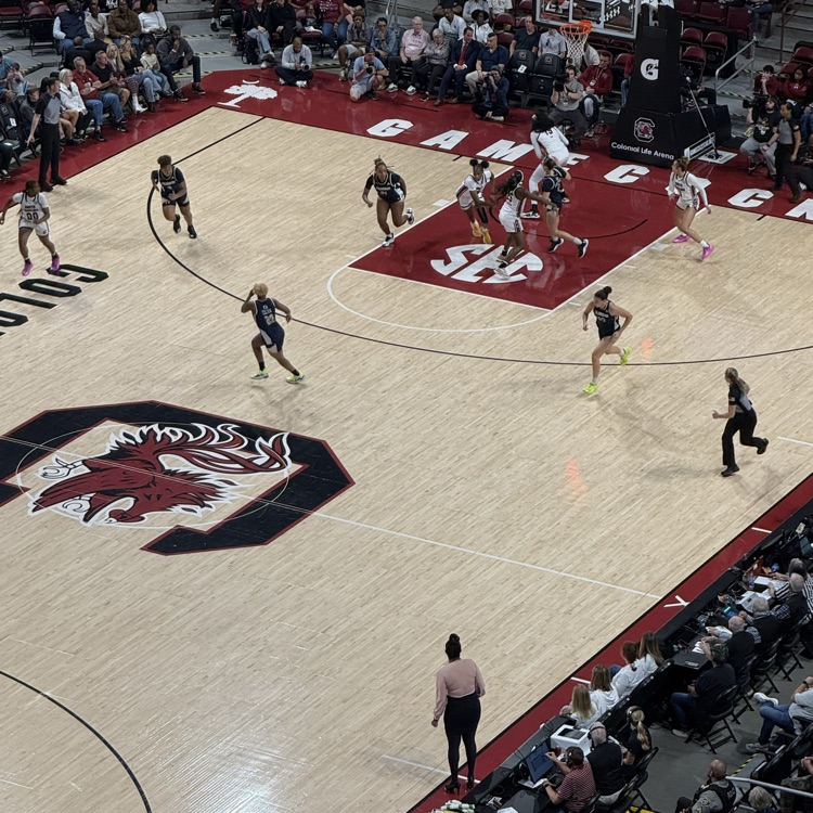 CCPSCCHS's tweet image. CCHS class of 2025, Kelley Hutcherson (number 9) is playing against #2 ranked University of South Carolina. Kelley is living her dream of playing division 1 basketball and studying sports management at Queen College.