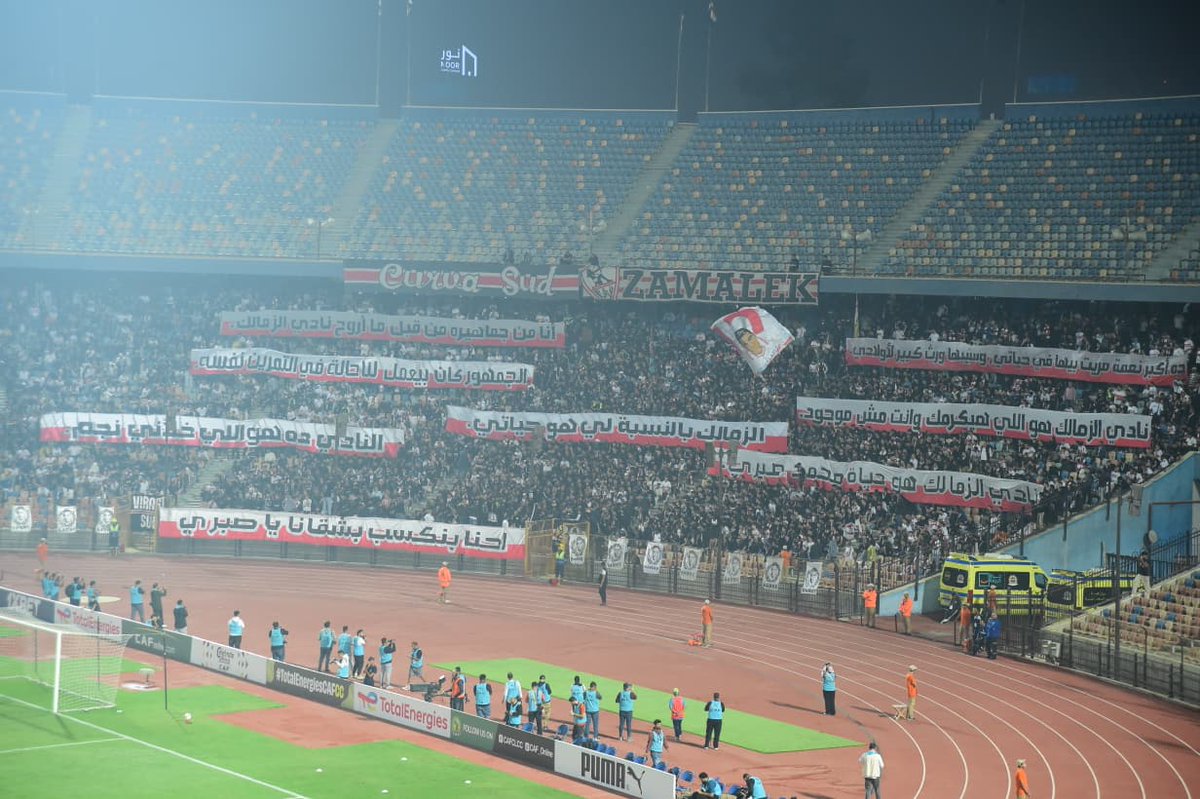 ZSCOfficial's tweet photo. مدرجات الزمالك تُذكرنا بأقوال أسطورتنا 🤍🏹

#Zamalek | #MostTitledIn20C | #الزمالك_أولًا | #أكبر_قلعة_رياضية https://t.co/kONcIpUHPm