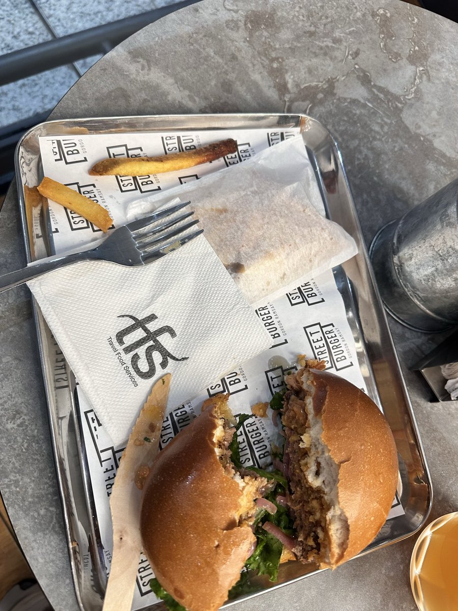 Motorcyclemonk's tweet photo. @GordonRamsay gives so much grief to small restaurant owners who do not meet his expectations of quality. He should try visiting his outlet in Delhi T1 airport.  Burnt fries, wooden knife to cut a burger bun. The burger was tasty though! https://t.co/Qcdxx5PPYF