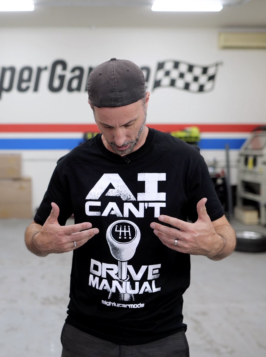 mightycarmods's tweet photo. Say NO to AI slop.

New 'AI can't drive manual' shirt on the MCM website
https://t.co/5JOdrpeTwP

AI is taking over the world? AI isn't even granny shifting, let alone double clutching like you should.

Grab one for yourself or a mate to prove that you're better than the AI slop 👌
