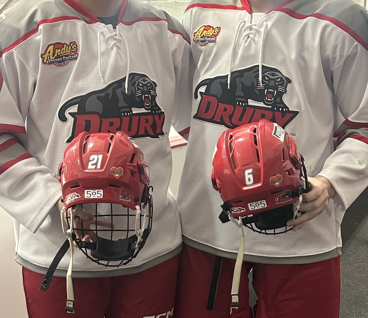Flames Alumni &amp; former captains Ravenstein &amp; Bowsher were away in Chicago with their Drury University team for the ACHA Showcase &amp; were not able to attend Friday.  That did not stop them from having Hakker with them as they wore his helmet stickers this weekend! 
#Family 
🔥❤️🕊️
