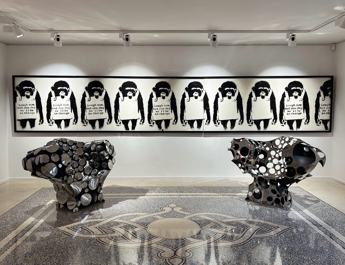 OperaGallery's tweet image. Now on view at Opera Gallery Paris: Banksy’s monumental ‘Laugh Now’ (2002), a rare three-part spray-painted panel and one of the most iconic works of his career. Ten monkeys stand side by side, six delivering the now-famous warning: ‘Laugh now, but one day we’ll be in charge.’…