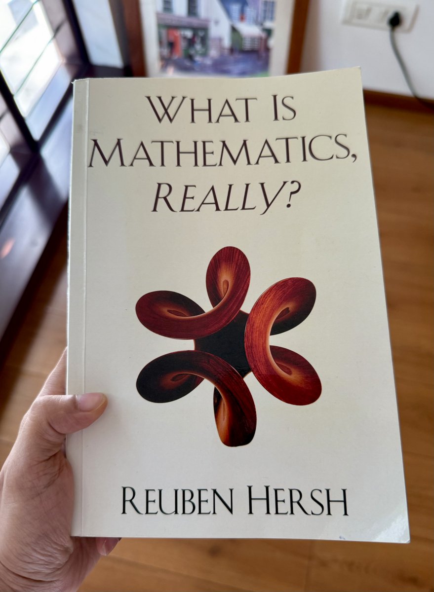 paraschopra's tweet image. What an absolute gem of a #book on the philosophy of mathematics!

The book asks an innocuous question - what are we doing when we’re doing mathematics?

Are we discovering entities, or creating new ones? What is a proof anyway? What happens when we find out that mathematics is…