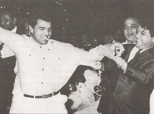 A nice memory of #Dharmendra dancing with #jaikishan while actor #Omprakash enjoying their chemistry during a party thrown by #rk in honor of #shankarjaikishanduo after they were received #PadmaShri
#DharmendraandSJ
#deathofdharmendra 
#shankarjaikishan 
#DharmendraDeol