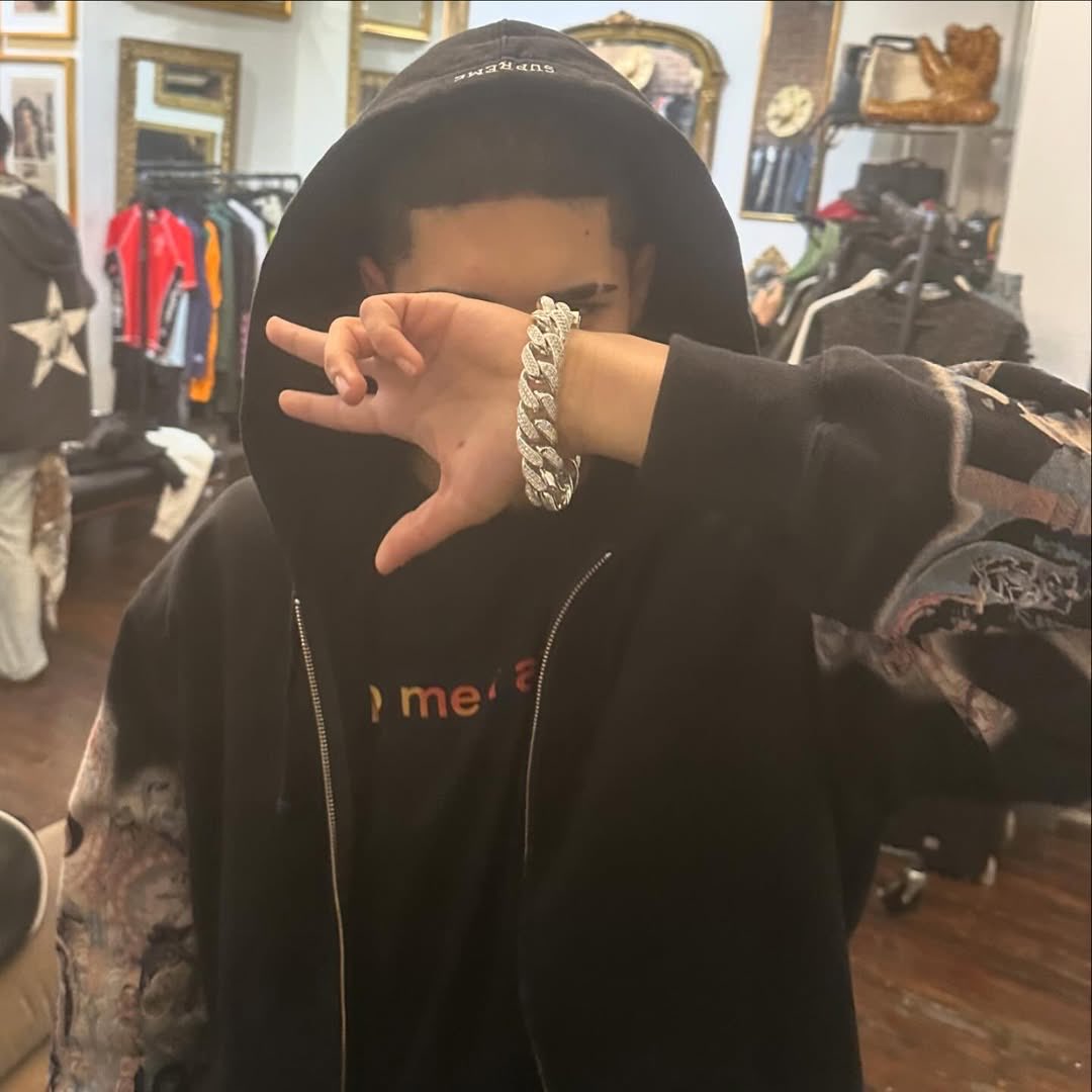 Fakemink wearing the Supreme x Michael Jackson Dangerous Zip Up Hoodie