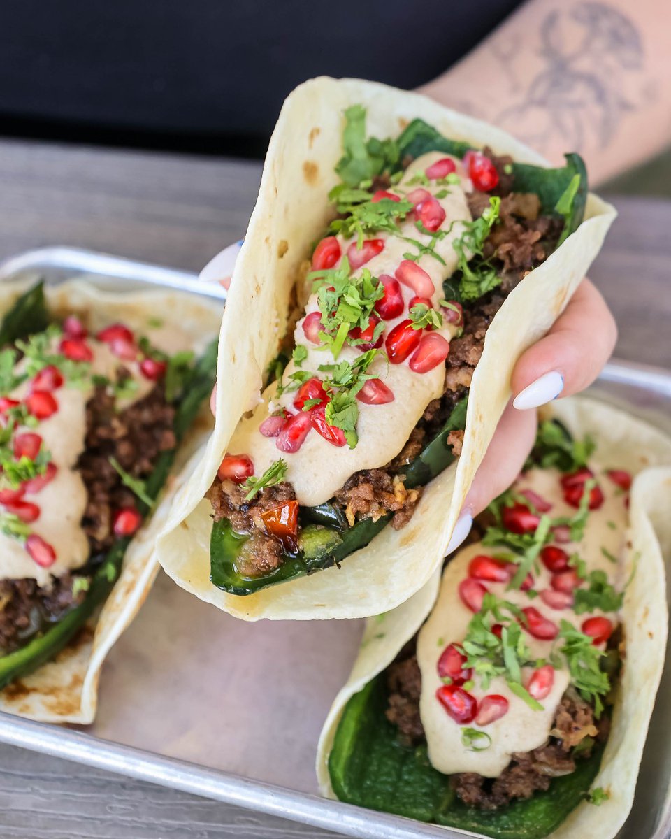 tacodeli's tweet image. Chile en Nogada in hand, no worries in sight 🌶️ Your holiday favorite is back for a limited time only.