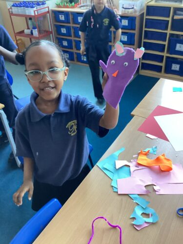 This week in DT, the Year 1 and 2 children have had a wonderful time creating their own animal puppets. After choosing their favourite animal, the children joined pieces of fabric using a method
of their choice - pinning, stapling or gluing before adding animal features!