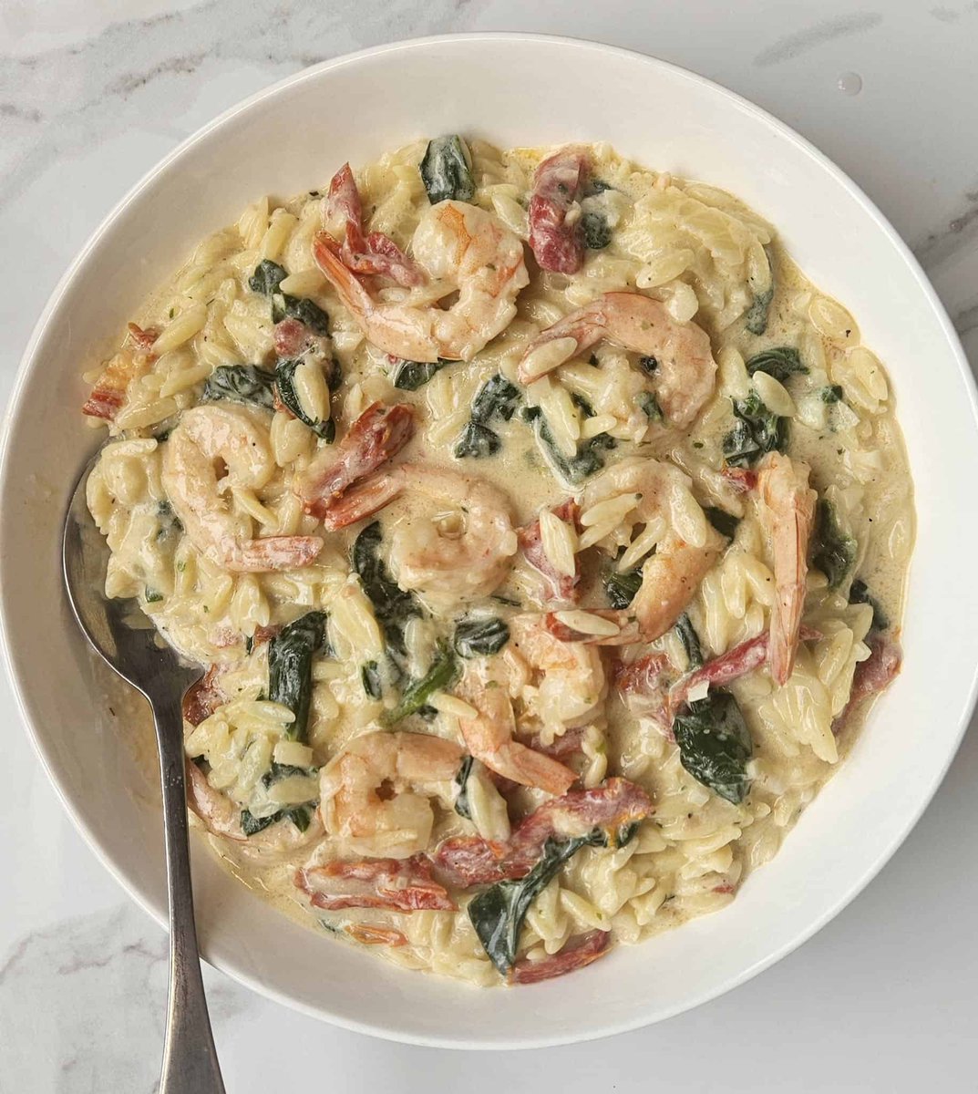 This Creamy (Marry Me Seafood) Orzo Pasta is an Italian dish that can be pulled together in 30 minutes and makes for a quick and easy weeknight dinner option. canadiancookingadventures.com/recipes/creamy…