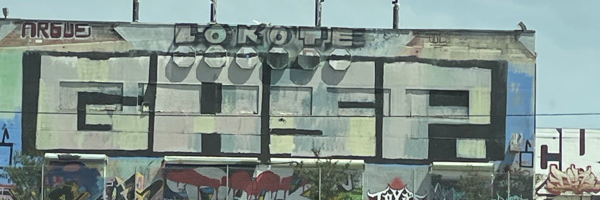 RoboticMoth's tweet image. I was on my way to Corpus Christi and I saw this graffiti I thought was funny and when I was choosing a banner it just fit so well