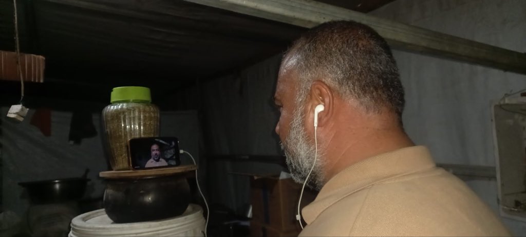 I am obliged to use kitchen kits to fix my mobile while talking with Al Jazeera &amp; other mass media tonight..
In addition to killing my wife and my three children, the Israeli occupation military attacked and destroyed my house, office and my sons’ supermarket during the genocide.