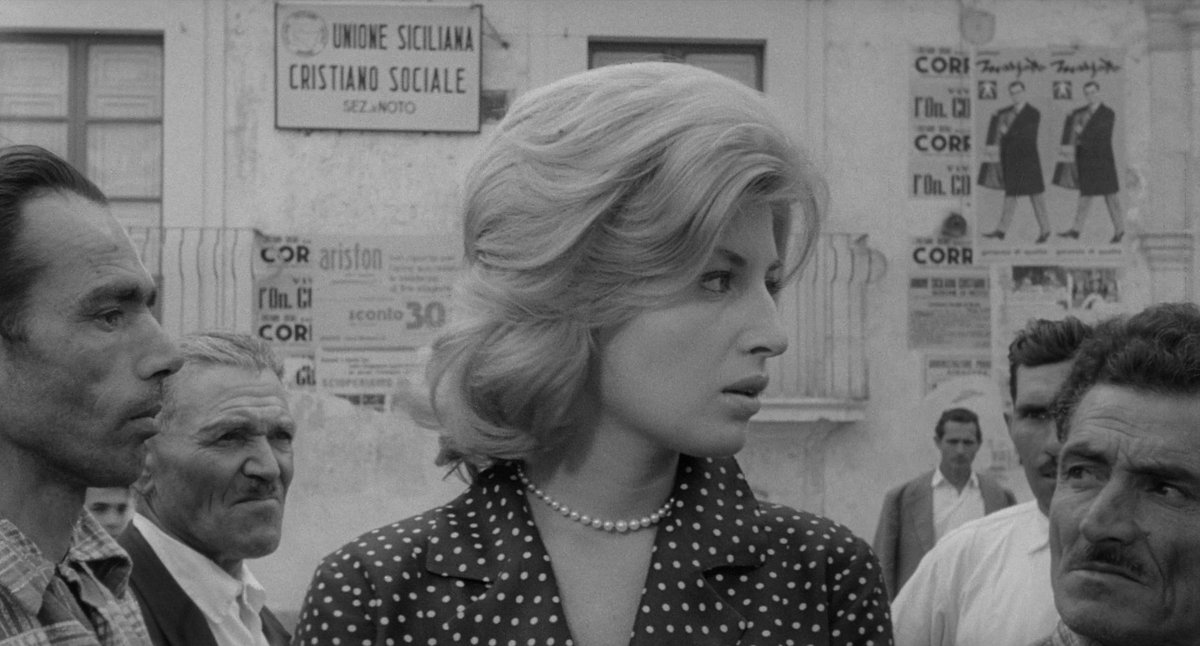 LewisBeerBlog's tweet image. Monica Vitti (in L’avventura) is surrounded by gawping men – it is like a scene from The Birds. The men look at her with frank desire and hostility, as if to say, ‘How beautiful she is, and how dare she exist.’ She treats this like a bad dream that just needs to be shaken off.