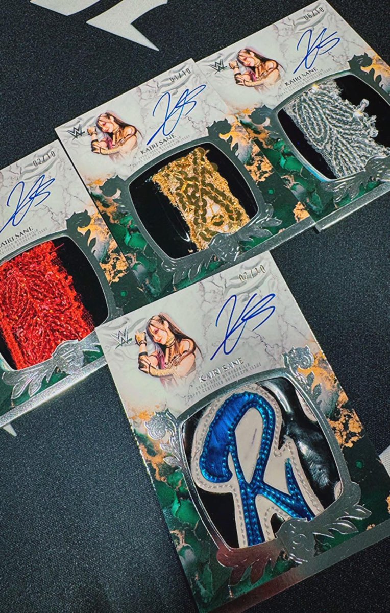 First look at completed and signed cards from Topps Royalty WWE with event worn gear - courtesy of Kairi Sane!