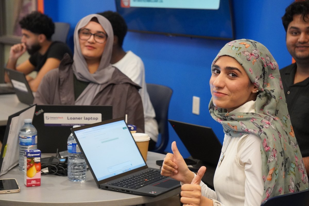 Photo of a student giving a thumbs-up during an activity session.