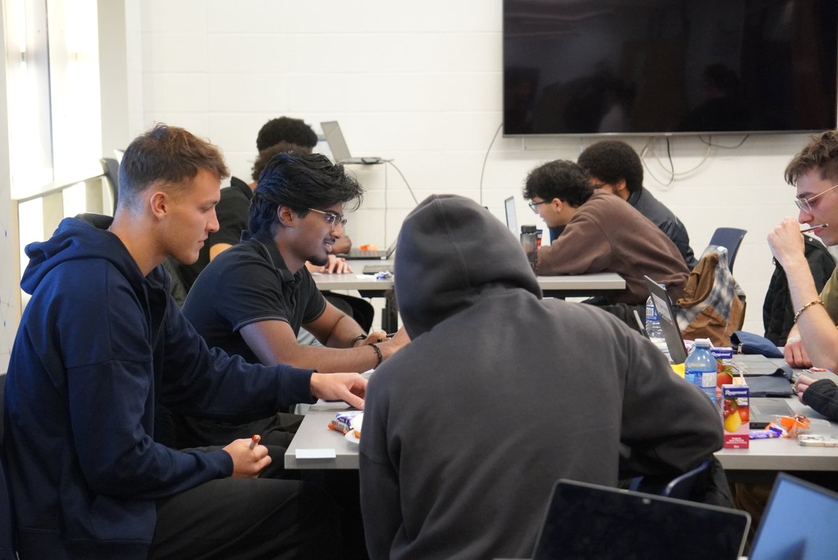 Photo of students working on their assigned laptops, actively completing user testing tasks.