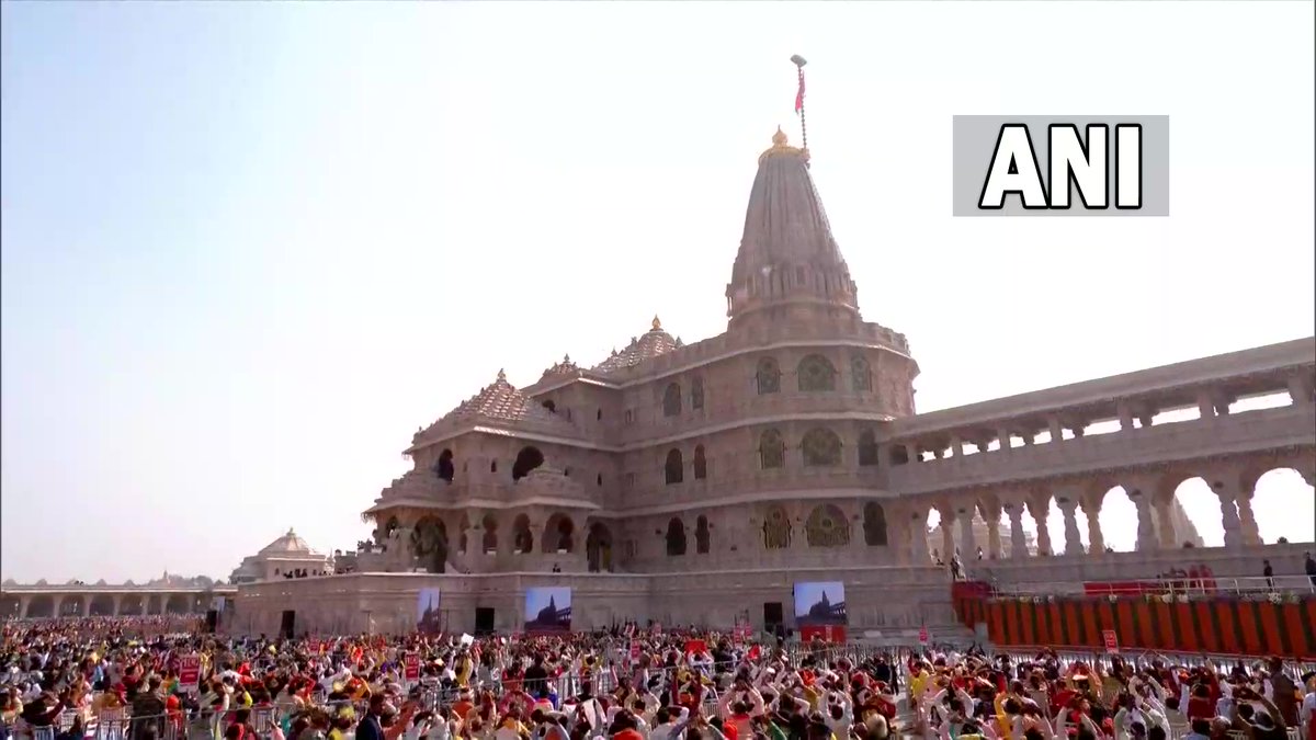 ANI's tweet image. Ayodhya Dhwajarohan | The Dharma Dhwaj, measuring ten feet in height and twenty feet in length, bears the image of a radiant Sun symbolising the brilliance and valour of Lord Shri Ram, with an ‘Om’ inscribed on it along with the image of the Kovidara tree. 

(Pics: DD)
