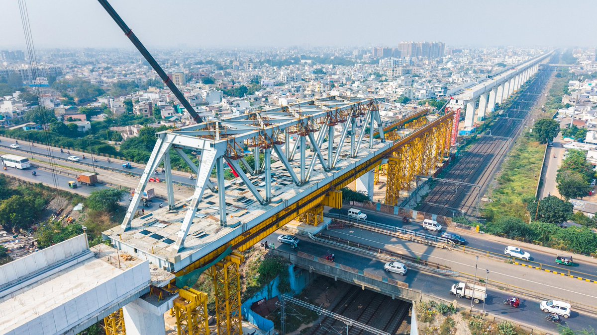 Strength in Steel, Speed in Sight 🚄  

The #MAHSR Corridor marks another milestone with the successful launch of a 670-metric-tonne steel bridge spanning 70 metres over the Cadilla Flyover in Ahmedabad, Gujarat. This is the 11th steel bridge launched for #Bullettrain project.