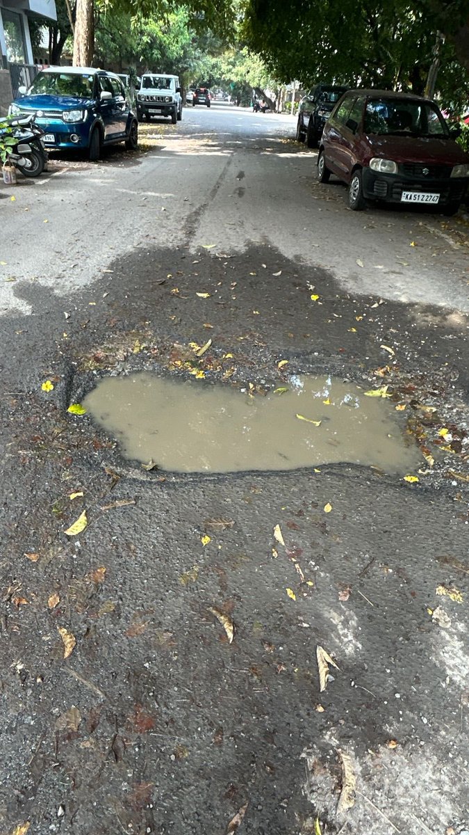 bengalurupost1's tweet photo. Several potholes dot residential areas in HSR Layout. One such pothole on 16th Cross started small and has now opened into a big crater — enough to hold a bucket of water. 🕳️💧

Residents say many have fallen in the early hours, and despite following up with the AE for 2 months, calls are being ignored. Even the Sahaaya App complaint hasn’t been acted upon. @GBA_office 

How are citizen complaints supposed to be addressed, @comm_blr_south?