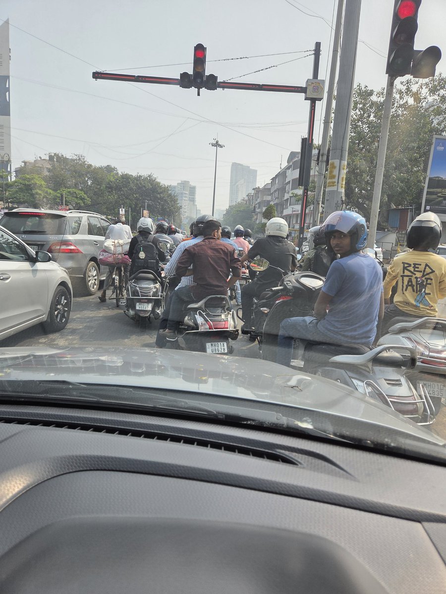 DoctorLFC's tweet image. My car was the first to reach the signal. I stopped behind the pedestrian crossing and the white line and within a minute, this is the situation in front of me.

In our country, those who follow rules are actually punished for doing so.