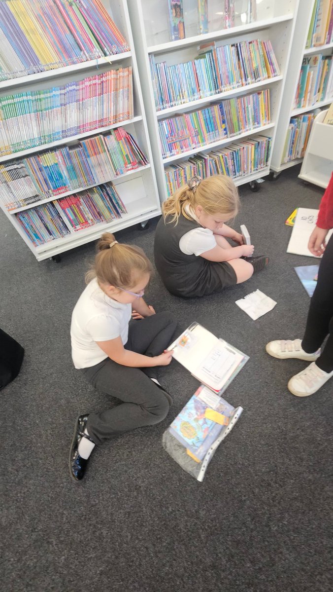 Reading and enjoying some of the books we have chosen today #library #books