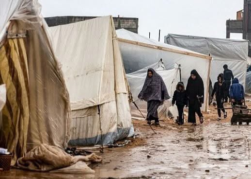 karamalloh's tweet photo. **"In Gaza’s winter, hearts stay warm despite the cold tents… patience is stronger than the storm, and the people of Gaza never break."** https://t.co/7CWXG9uC59