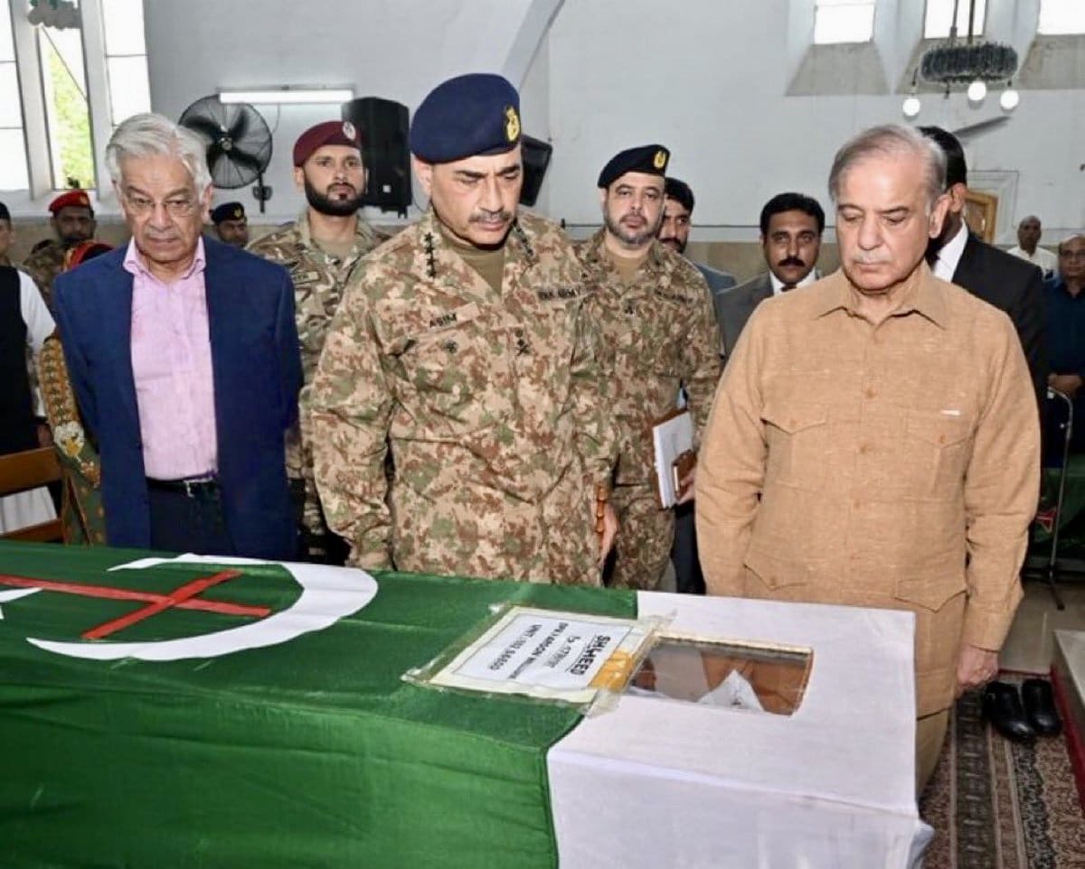 A Christian soldier of the Pakistan Army was martyred in a recent terrorist attack by Khawarij terrorists. His coffin is draped in the Pakistani flag, but with a red cross embossed in the centre of the Pakistani flag:

The Pakistani nation is proud of our Christian brothers.