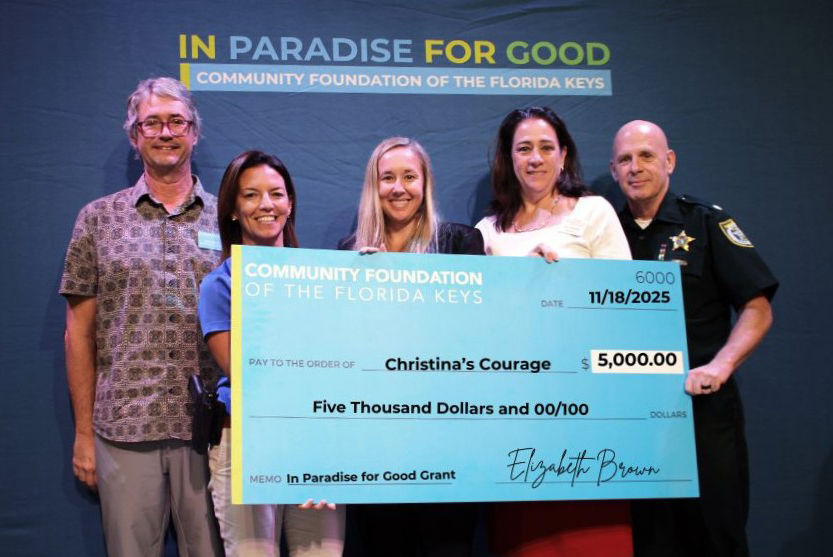 MCSO Bureau of Corrections Major Tim Age, Womankind Executive Director Cali Roberts, Kevin Bowes with the Community Foundation of the Florida Keys, MCSO Inspector Christina Cory, and MCSO Islamorada MCSO Capt. Lissette Quintero received a Christina’s Courage Rape and Crisis