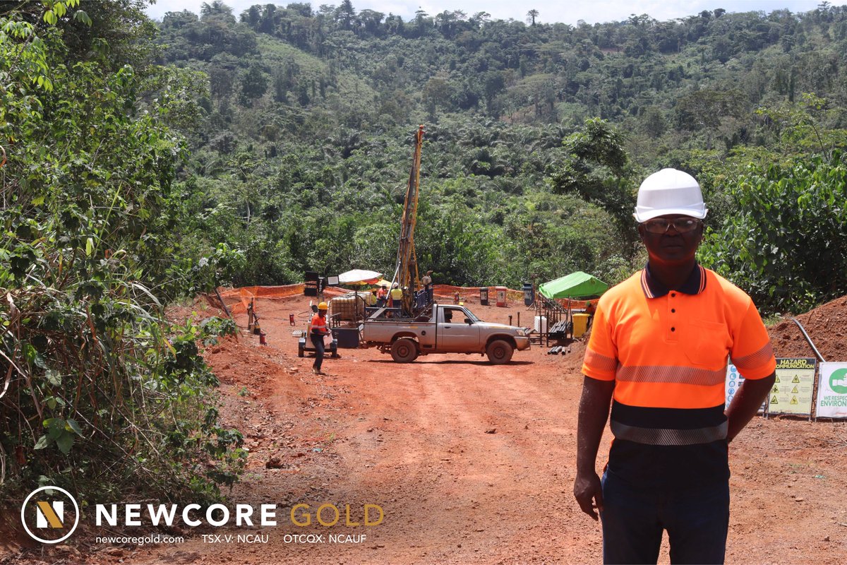 *Snapshots from Site* 📸: Senior Geologist Tony Asare standing in front of a diamond drill rig at Newcore Gold's Enchi Gold Project in Ghana. A 45,000-metre drill program is underway at Enchi focused on discovery and resource growth. 

#development #exploration #gold #Ghana