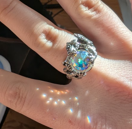 MostlyHarmless5's tweet photo. @BadaliJewelry This ring is the best thing ever!  Little Arkenstone prisms, love it. https://t.co/QDb3Gtec05